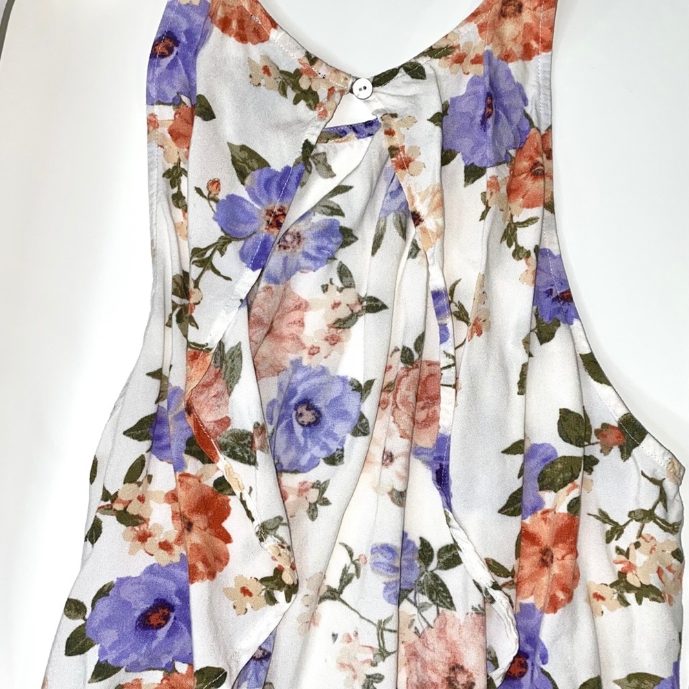 Soft floral top open in the back